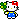 Hello Kitty holds a four leaf clover.